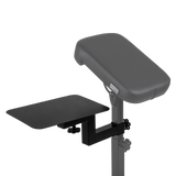 Black steel Shelf for Armrest by GG Workshop — flat tray clamped to armrest column below the pillow, close-up