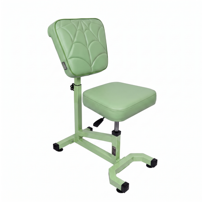 Pistachio green Multifunctional Swivel Chair with Armrest by GG Workshop — spider web stitched backrest, frame painted in matching pistachio, three-quarter view