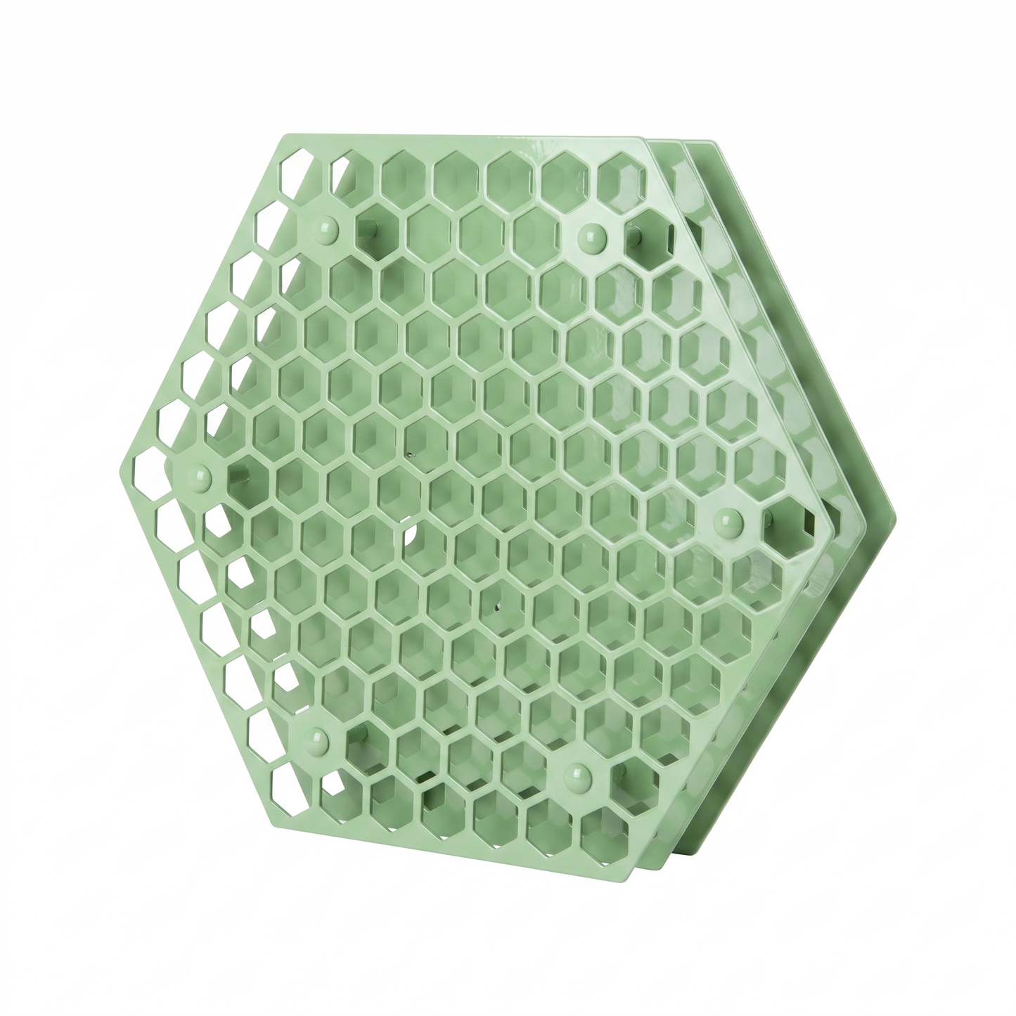 Pistachio green hexagonal Tattoo Ink Wheel - Rotary Rack by GG Workshop — layered honeycomb-pattern plates, angled view