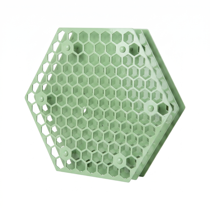 Pistachio green hexagonal Tattoo Ink Wheel - Rotary Rack by GG Workshop — layered honeycomb-pattern plates, angled view