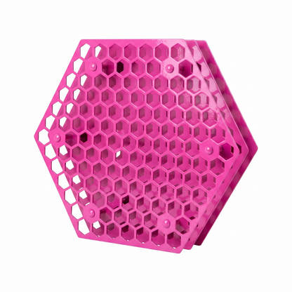 Max Pink bright pink hexagonal Tattoo Ink Wheel - Rotary Rack by GG Workshop — layered honeycomb-pattern plates, angled view