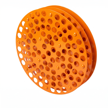 Orange round Tattoo Ink Wheel - Rotary Rack by GG Workshop — stacked perforated discs, angled view