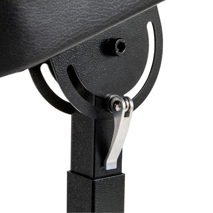 Adjustable tattoo armrest with black vinyl cushion and sturdy metal frame for client comfort.